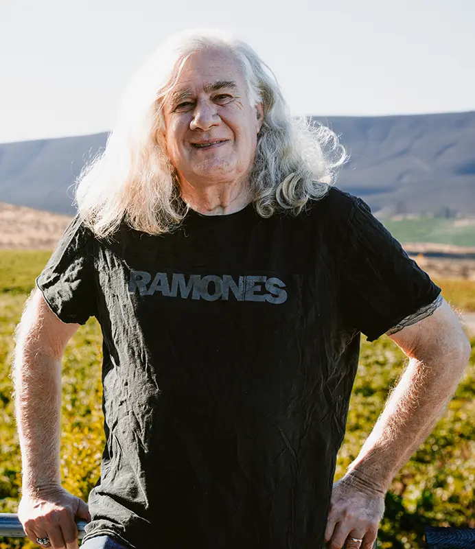 Chris Unchurch posting in from of vineyard